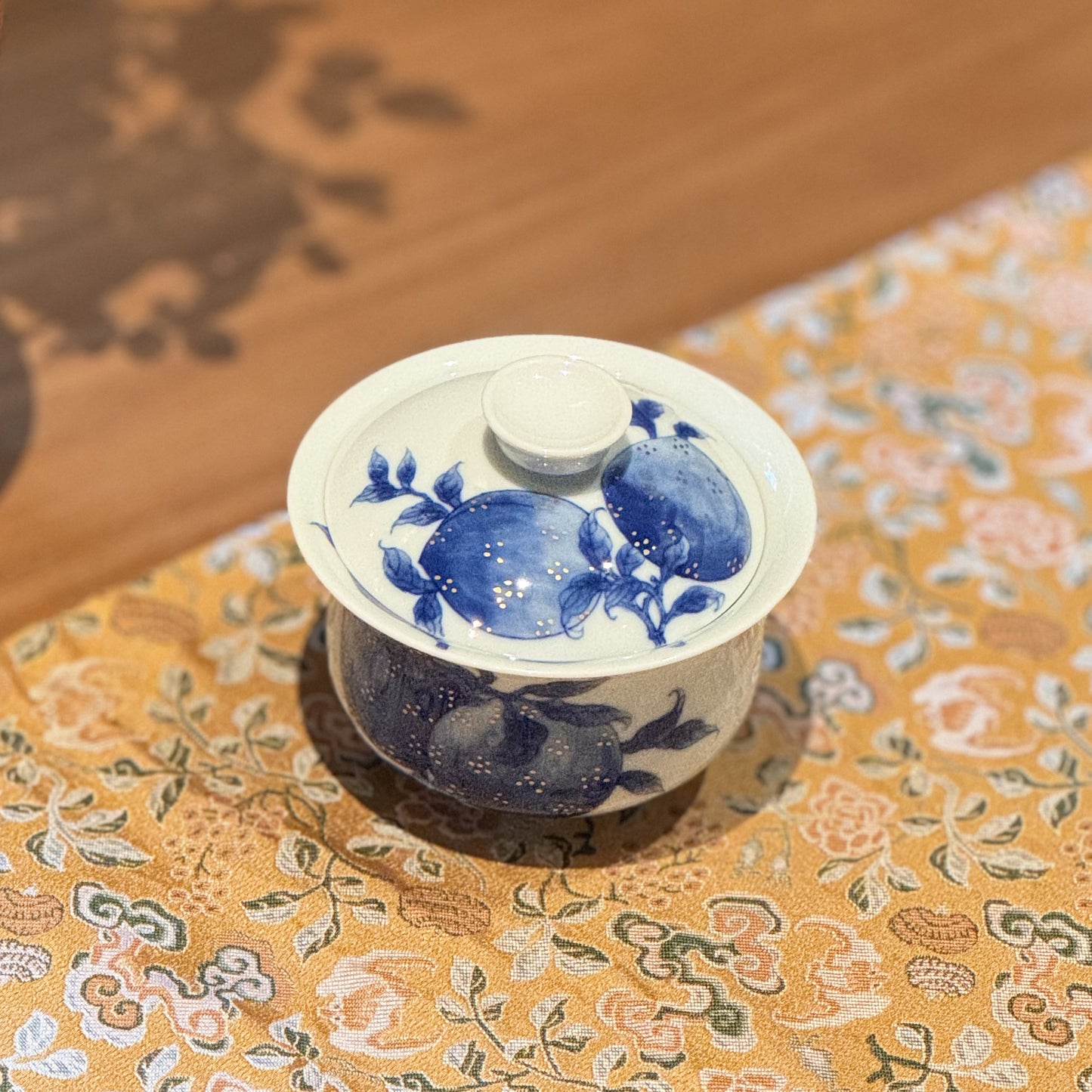 Blue-and-White Three-Piece Set with Longevity Peach Motifs and Gilt Accents