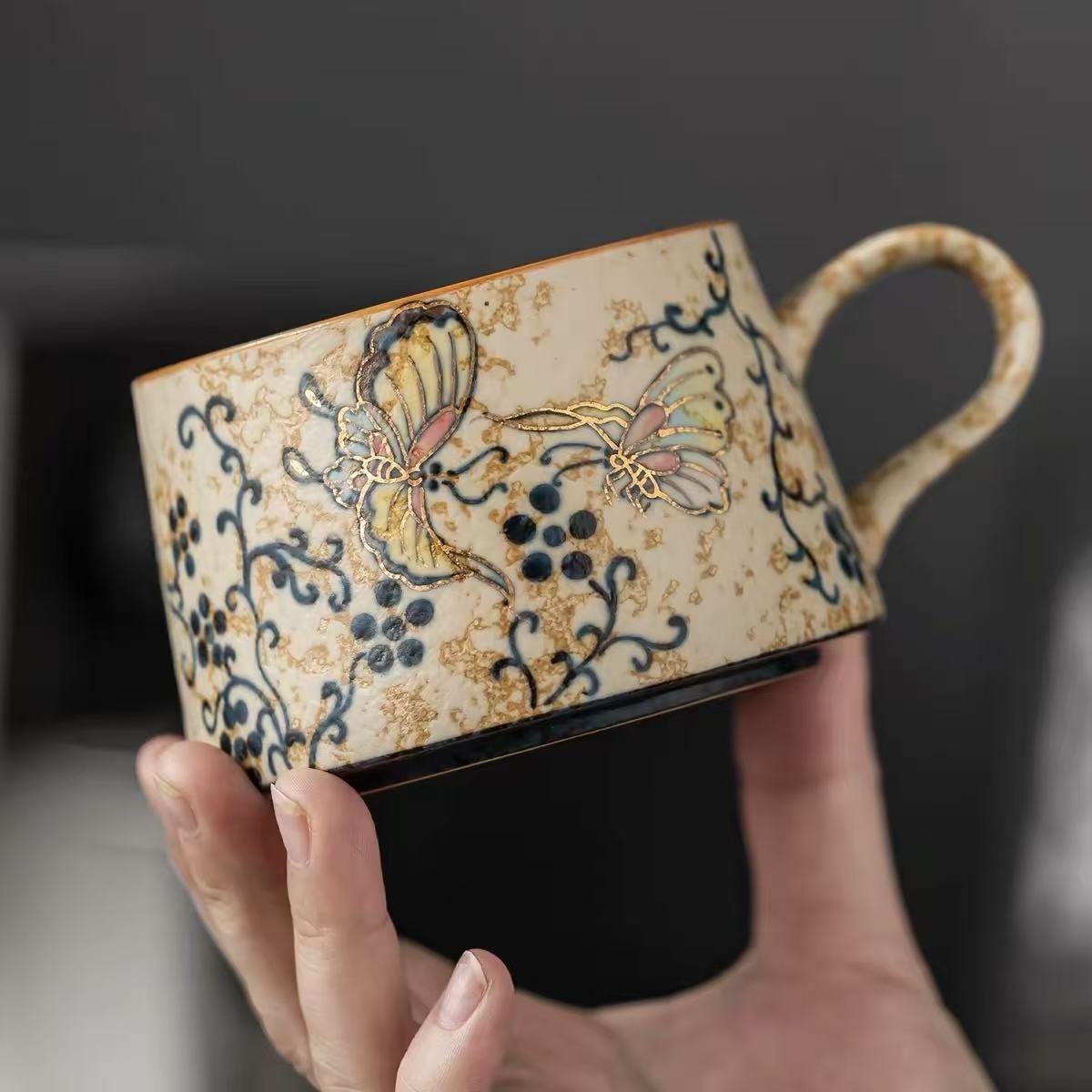 Hand-painted gold coffee cup
