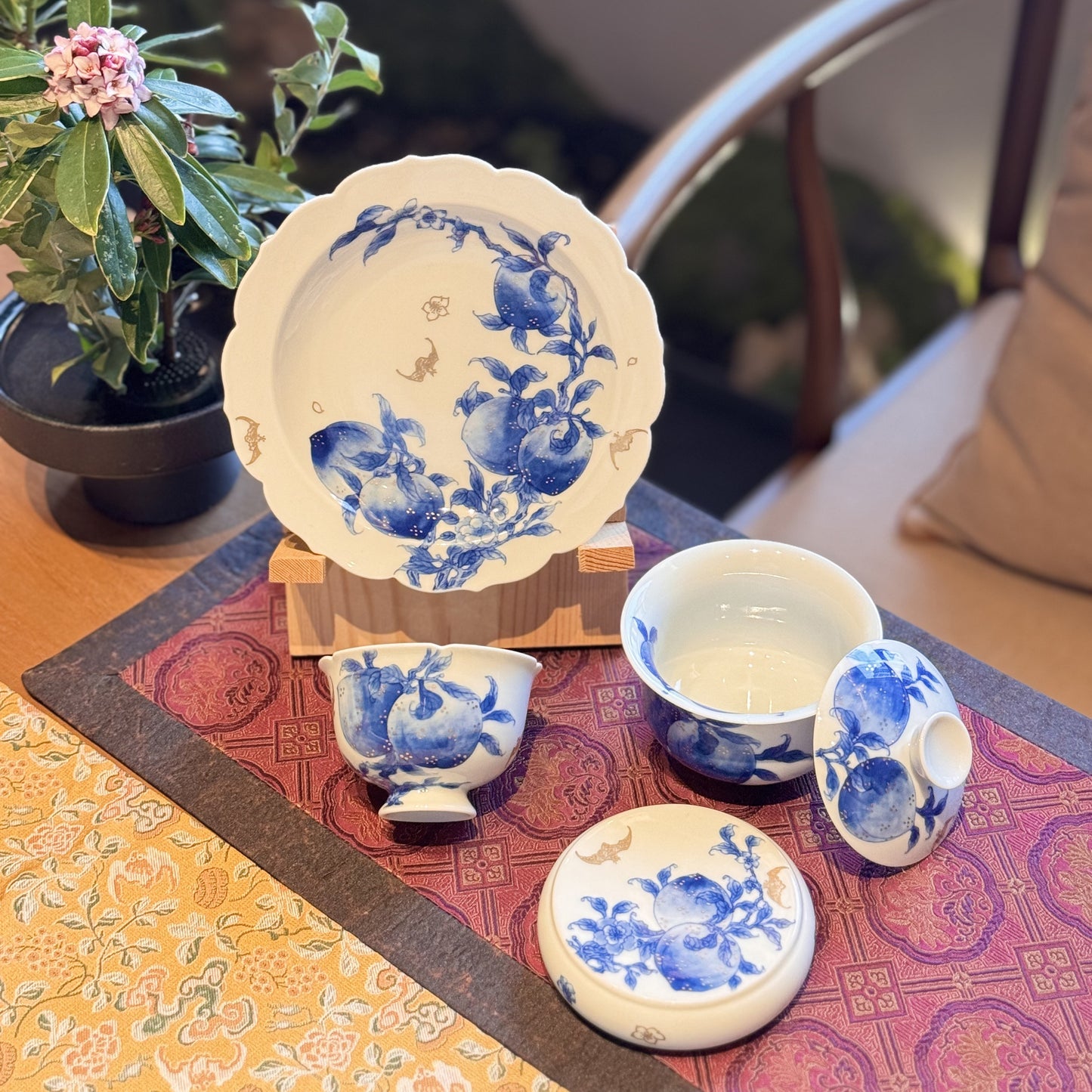 Blue-and-White Three-Piece Set with Longevity Peach Motifs and Gilt Accents